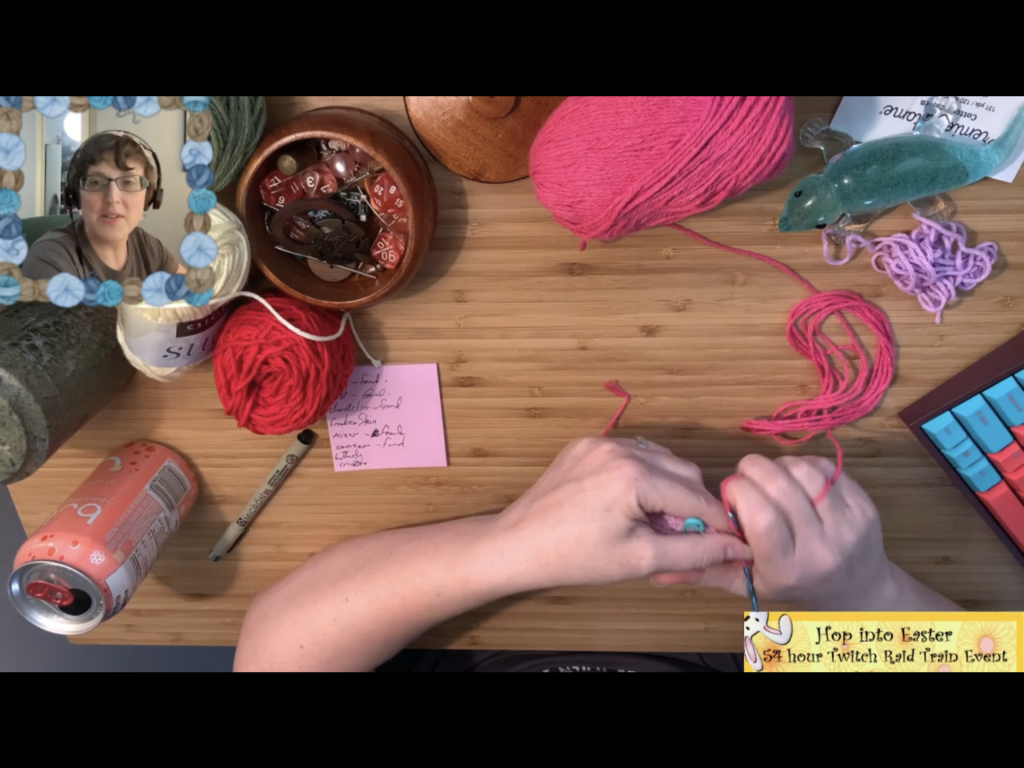 My stream, showing me crocheting the bag and all the stuff on my desk